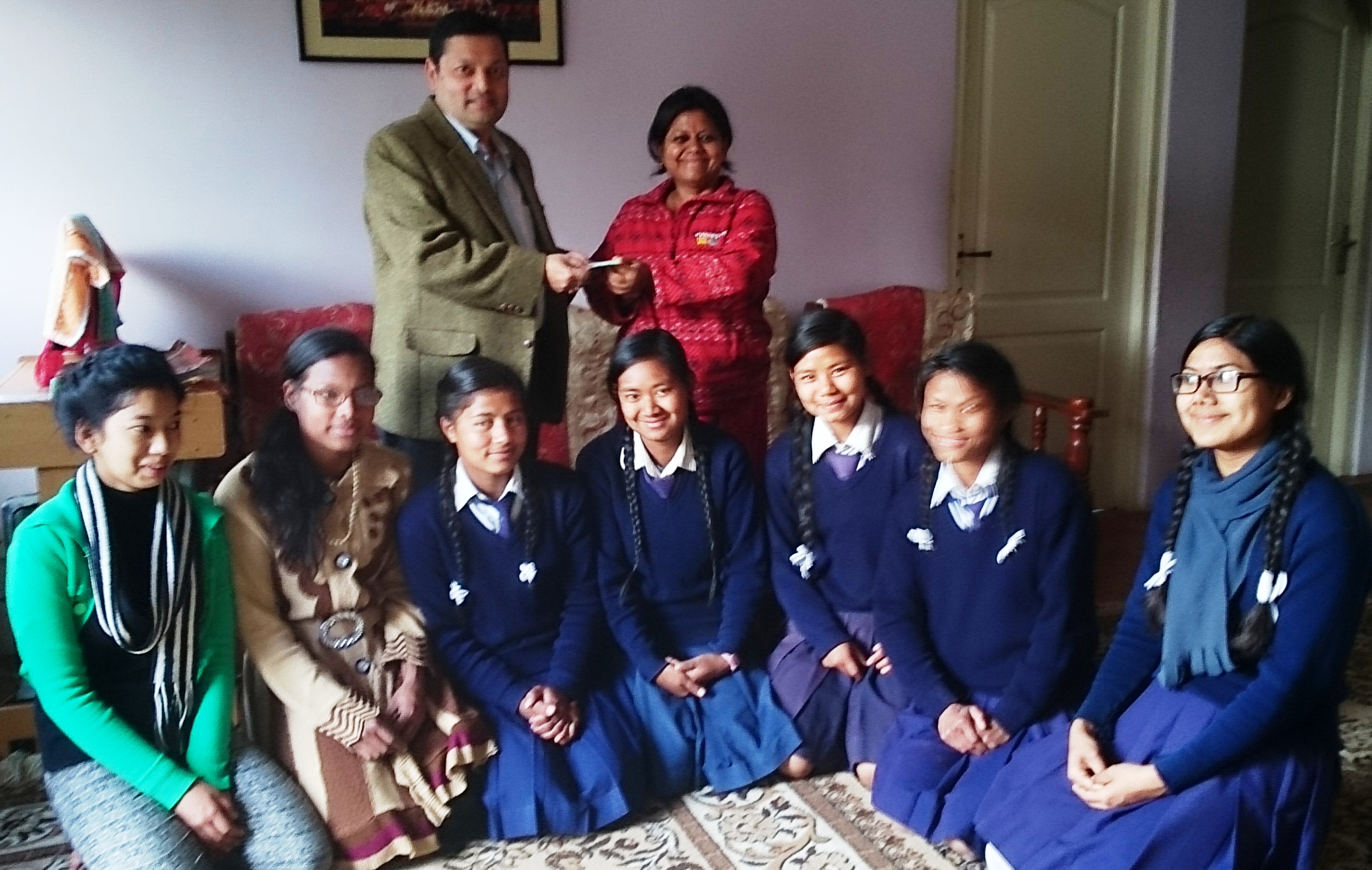 South Asia Foundation Nepal Chairperson Handing over Cheque of NPR 30,000 to Taal