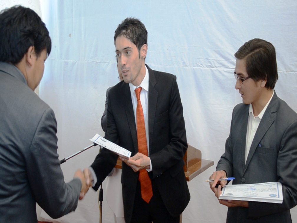 Hamidullah Arefi, secretary South Asia Foundation-Afghanistan distributing certificates on cultural heritage in Bamyan